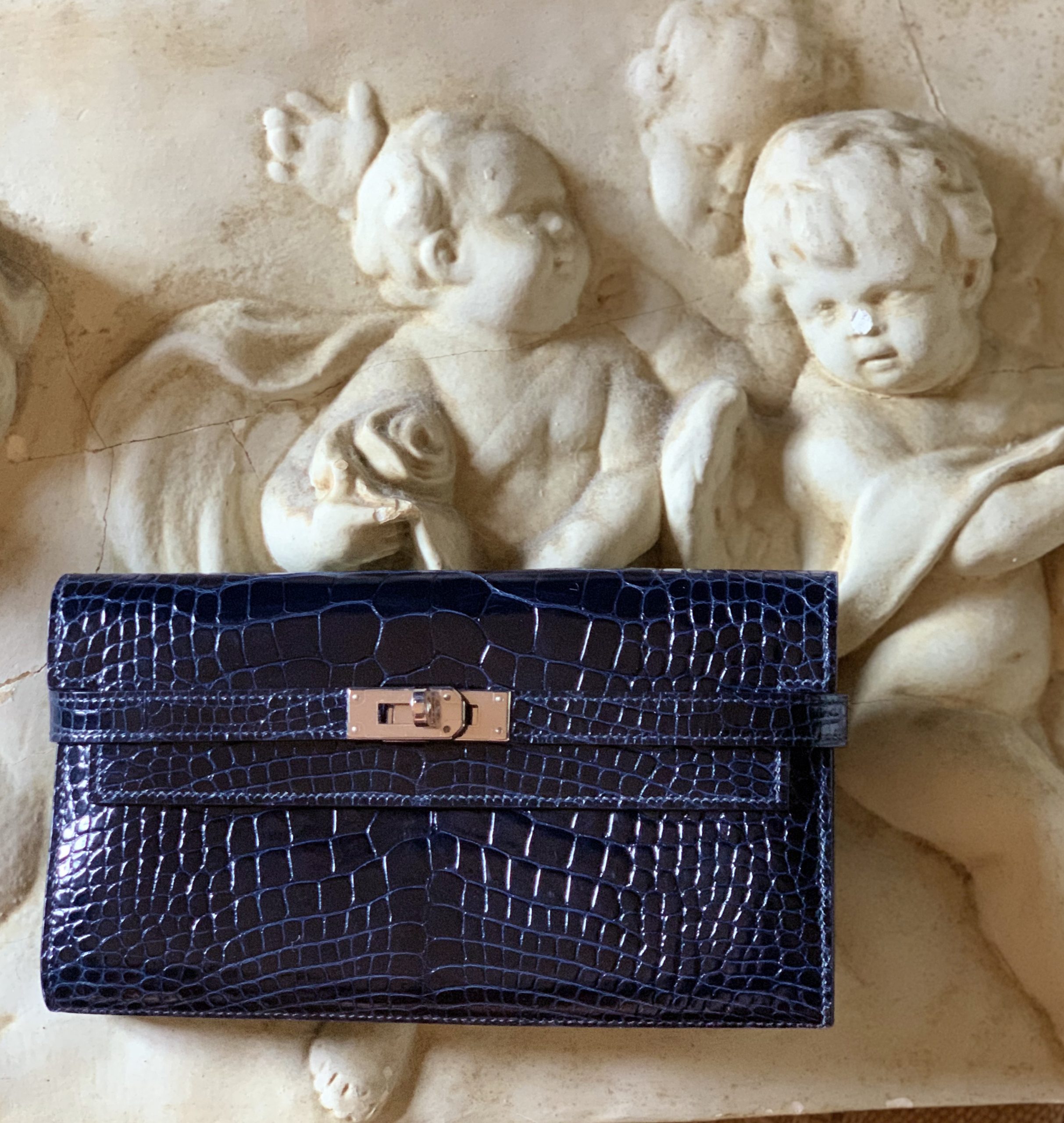 Hermes Kelly Wallet in shiny navy blue alligator with palladium
